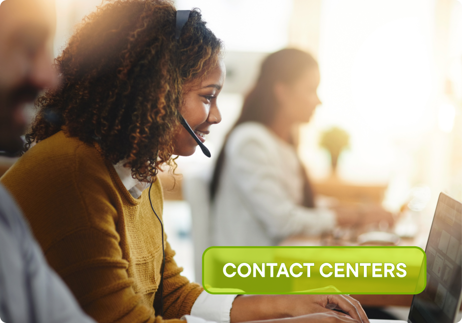 Picture of a happy customer service operator answering calls in an open office. Overlayed with the sticker "Contact Centers"