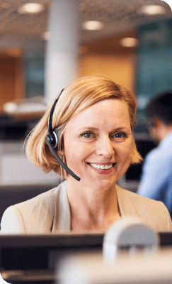 Image of a smiling customer service representative looking at the camera